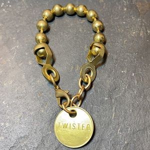 Twisted Silver Bracelet. Coin with engraved brand